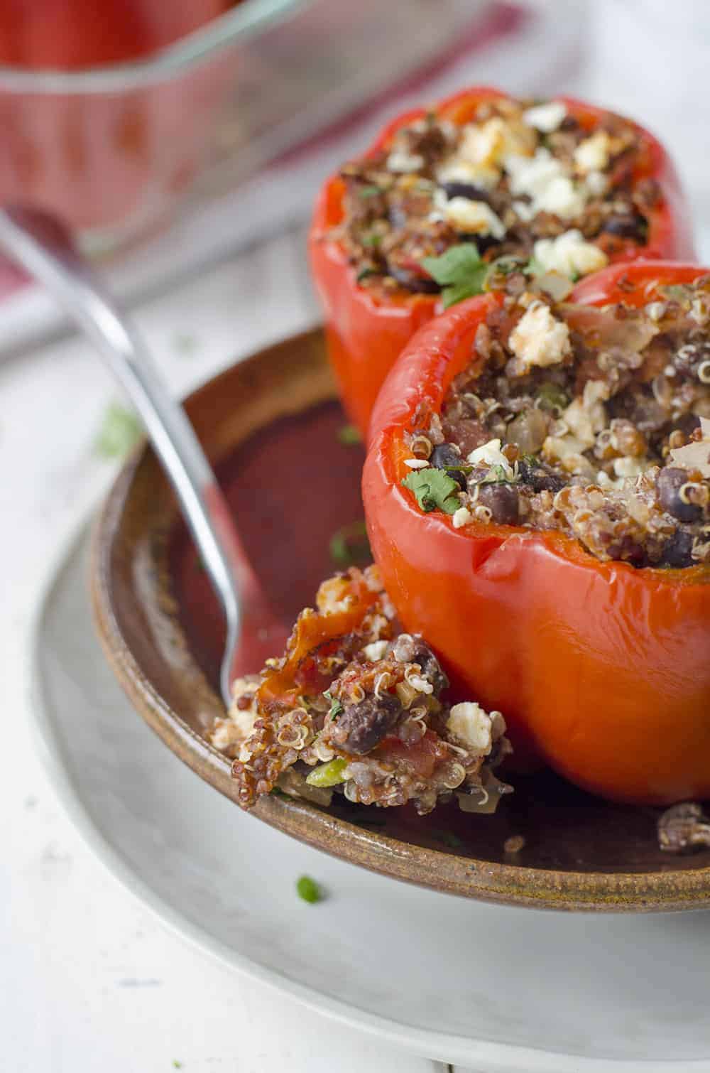 Southwestern Quinoa Stuffed Peppers - Delish Knowledge